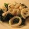 Calamari scottati con spinaci, quenelle di ricotta e pepe di Seichuan Calamari scottati con spinaci, quenelle di ricotta e pepe di Seichuan
