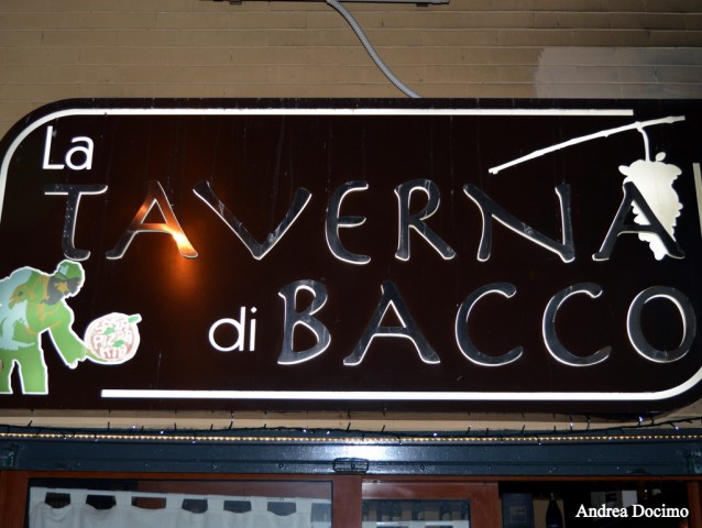 B-ZONE & La Taverna di Bacco. L' insegna del locale.