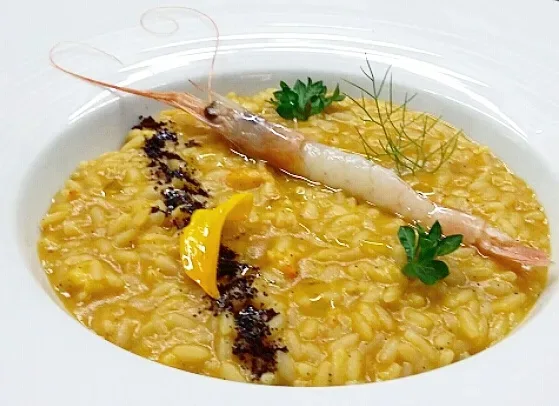 Risotto alla crema di zucca, gamberi e polvere di caff