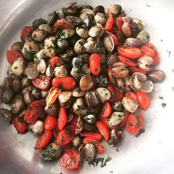 Pomodorini del pendolo e vongole veraci