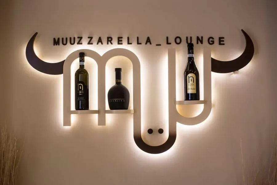 Muu Muuzzarella, Il Logo