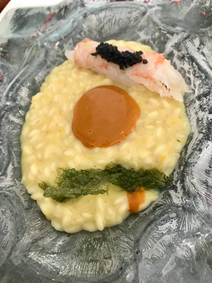 Don Alfonso, riso ai sentori di agrumi biologici con emulsione di ricci, scampi e caviale