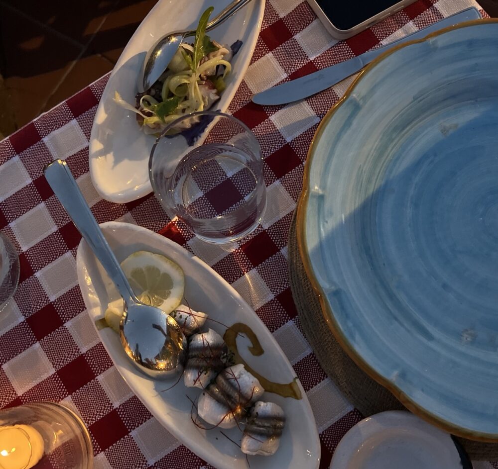Polpo all'insalata con puntarelle croccanti e Alici marinate