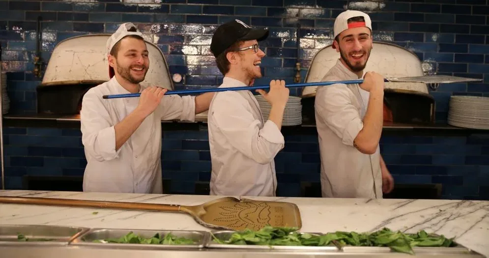 Giovani pizzaioli del gruppo Big Mamma