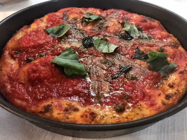 Ristorante Pizzeria Bronzetti - pizza nel ruoto