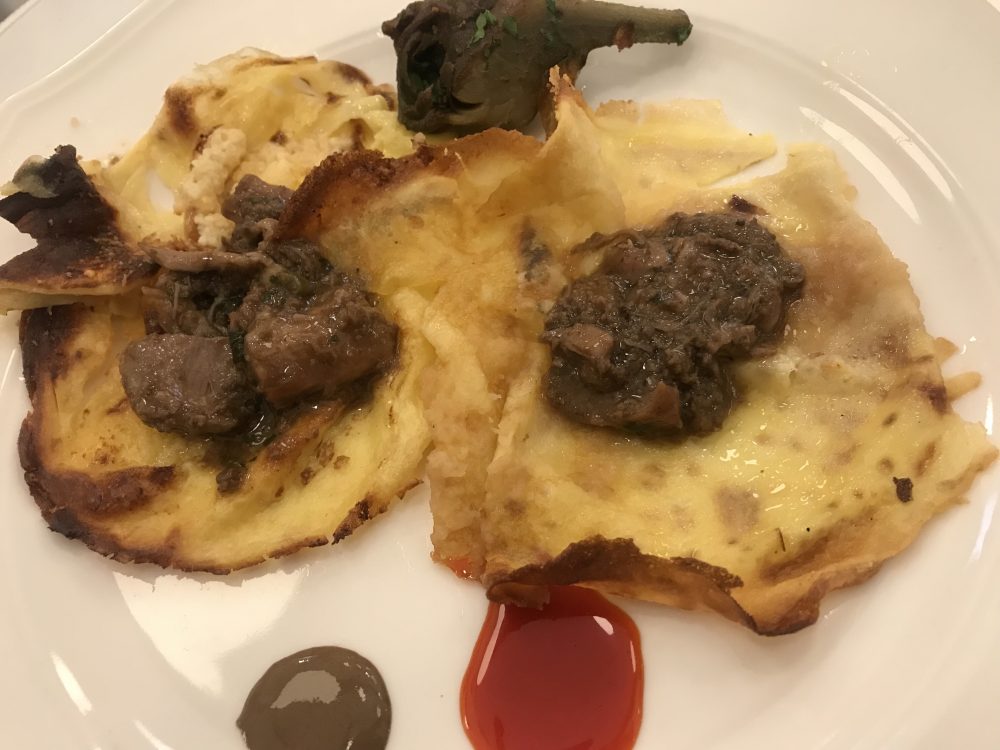 Al Portico, crespelle complete- ragu di agnello, riduzione al peperone, salsa al pepe nero