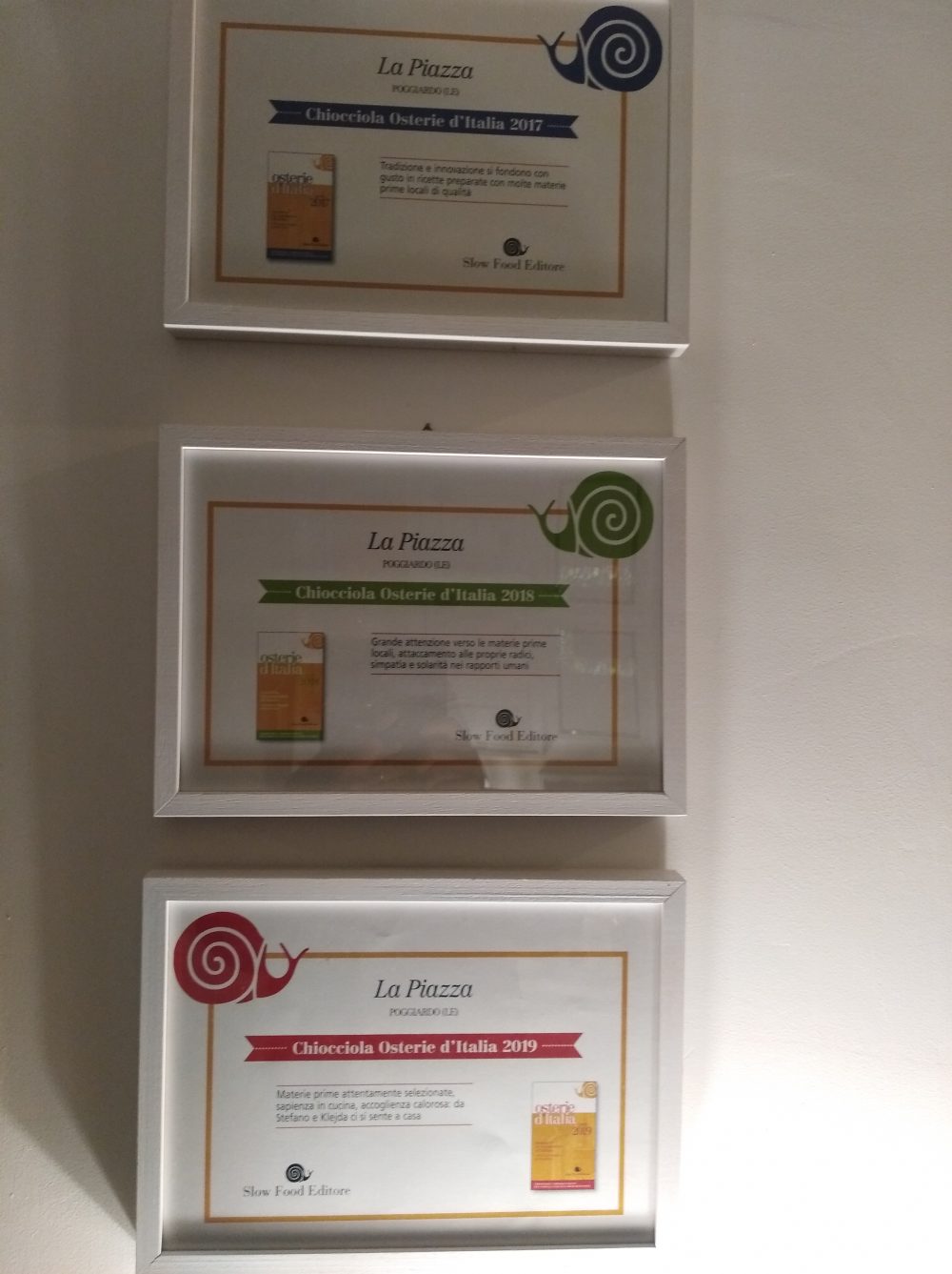 Ristorante La Piazza Alcuni premi della Chiocciola di Slow Food