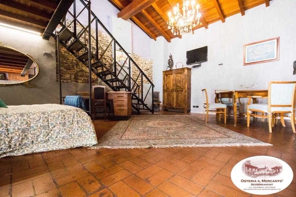 Il Mercanto' Camera da letto in B&B