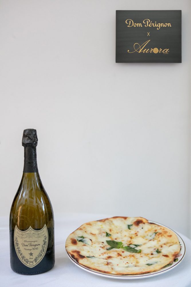 Dom Perignon e pizza all'acqua