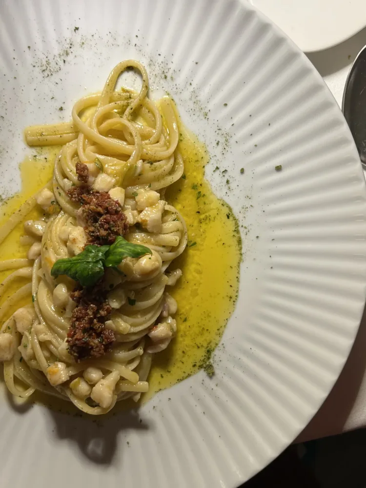 Linguina con scorfano marinato al limone bottarga e pomodoro secco