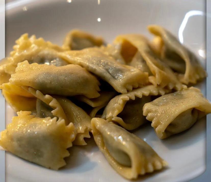 Calabryando - agnolotti pizzicati a mano al sugo d’arrosto con manzetta podolica e spinaci