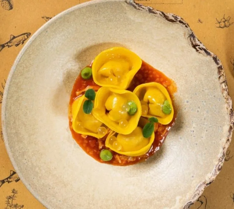 Tortelli di pesce siluro del Lago d'Iseo, trippetta di lago e caviale al limone - Slow Fish