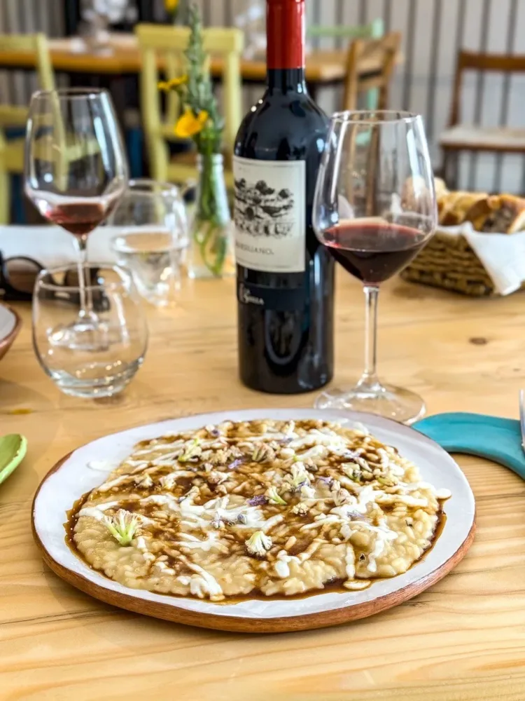 Risotto, espressioni di cavolfiore, parmigiano vacche rosse, mosto cotto, aceto di mele e caffè -Masseria Sardo