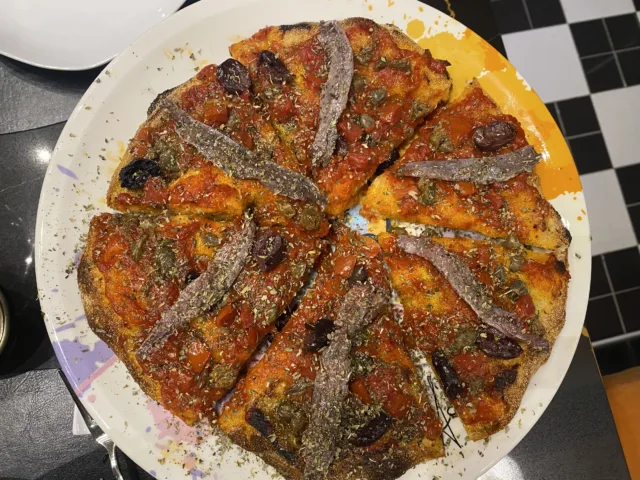 Pizza-in-pala-Fondamentale-di-Marinara