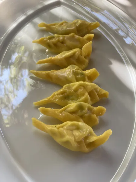 Tortelli piacentini e coda