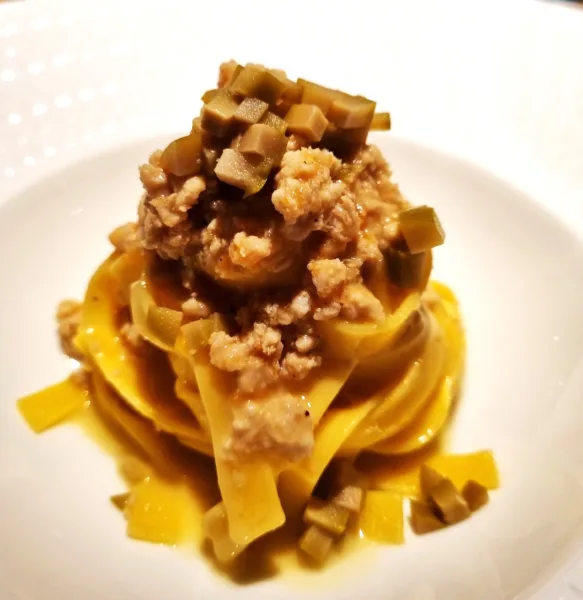 Almatò - tagliatella, coniglio, beurre blanc all’arancia e olive