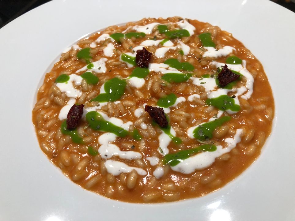 Ristorante Aquadulcis Risotto al pomodoro, bufala ed origano