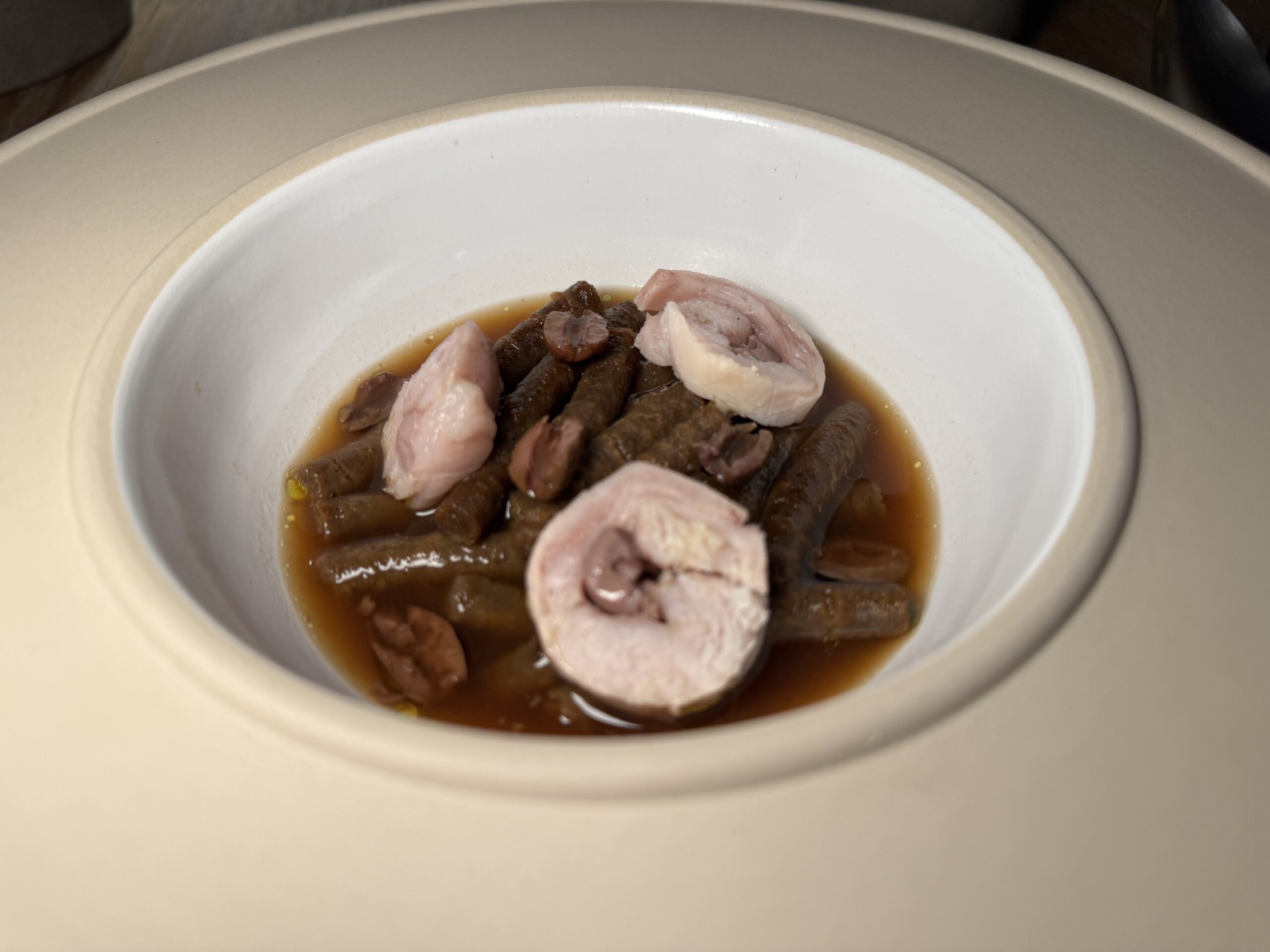 Passatelli di grano arso, garum di coniglio ed erbe selvatiche, Borgo Santa Cecilia, Gubbio