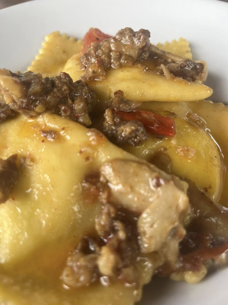 ravioli porcini e salsiccia